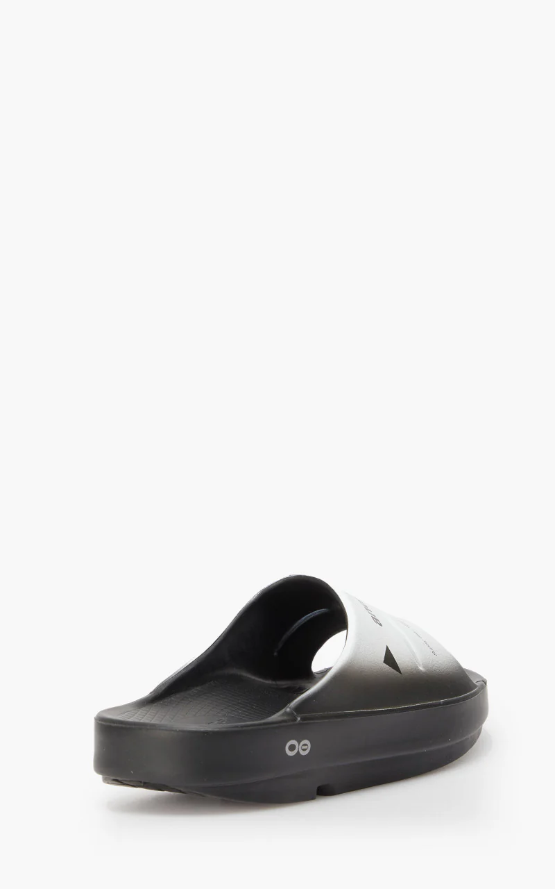 and wander x OOFOS Ooah Slide Black/White - Image 4